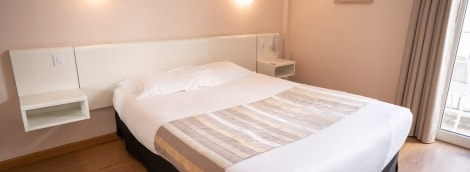 Hotel Mondial, kambarys