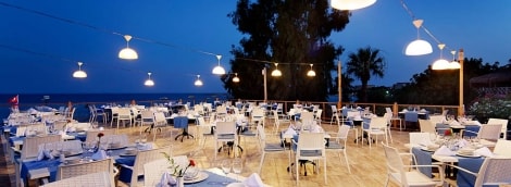 Justiniano Club Alanya restoranas ant jūros kranto