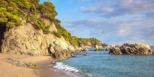 Playa De Sa Boadella papludimys krantas